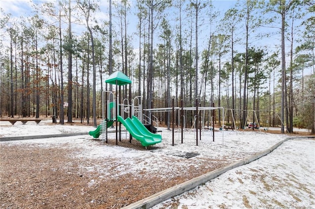 snow covered playground featuring playground community