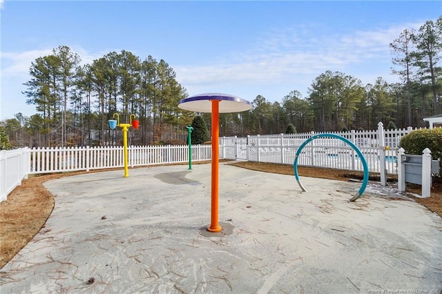 view of jungle gym with fence