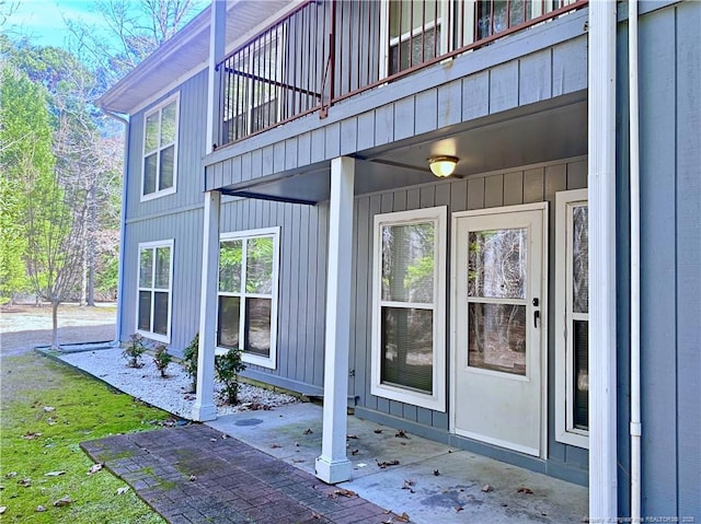 property entrance with a balcony