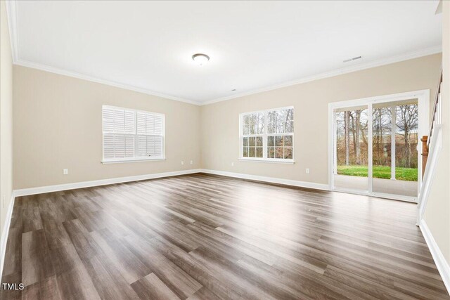 1985 Meadowview Dr, Graham, NC 27253 - empty room featuring baseboards, visible vents, wood finished floors, and crown molding