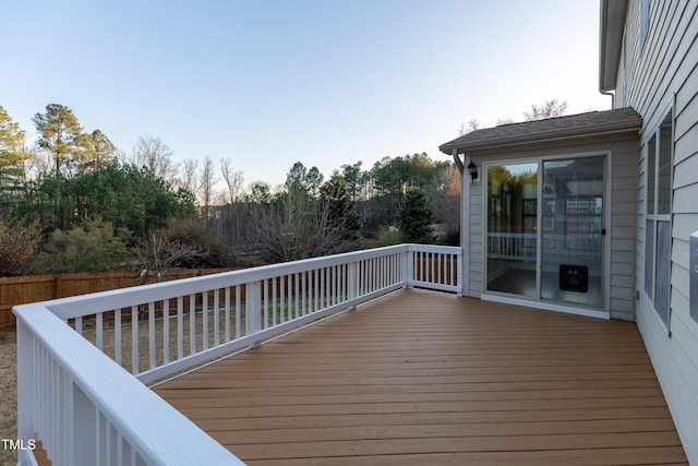 wooden deck featuring fence