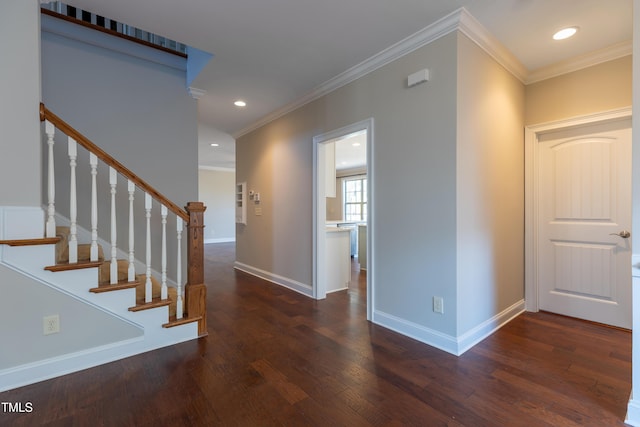 entrance foyer featuring recessed lighting, ornamental molding, baseboards, and wood finished floors