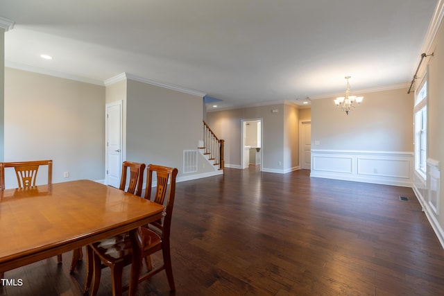 dining space with stairway, a notable chandelier, visible vents, and dark wood-style floors