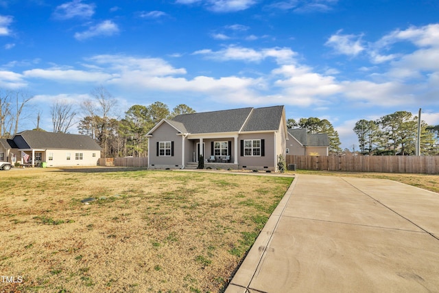 view of front of home with crawl space, covered porch, fence, and a front lawn