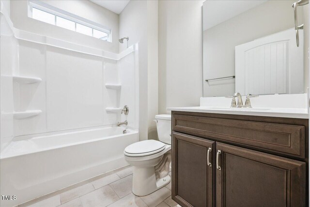 1987 Meadowview Dr, Graham, NC 27253 - full bathroom featuring toilet, vanity, tile patterned flooring, and bathtub / shower combination