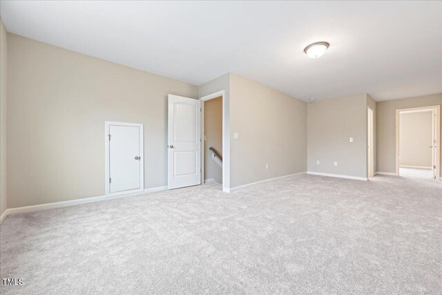 1987 Meadowview Dr, Graham, NC 27253 - spare room with baseboards and light carpet