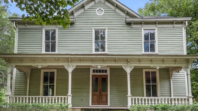 italianate-style house with a porch