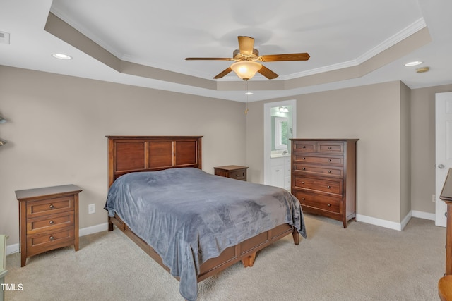 bedroom featuring recessed lighting, light carpet, baseboards, a raised ceiling, and crown molding