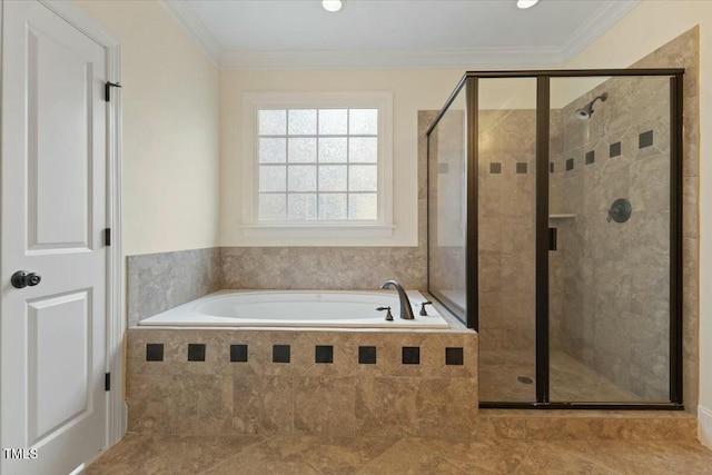 full bathroom featuring a garden tub, a shower stall, and crown molding