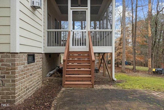 view of playground with a sunroom