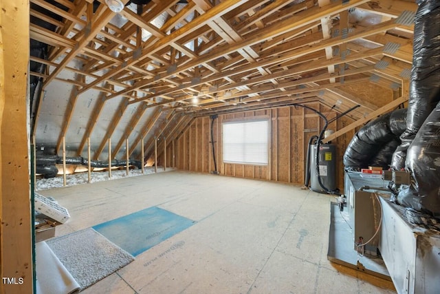 attic featuring electric water heater