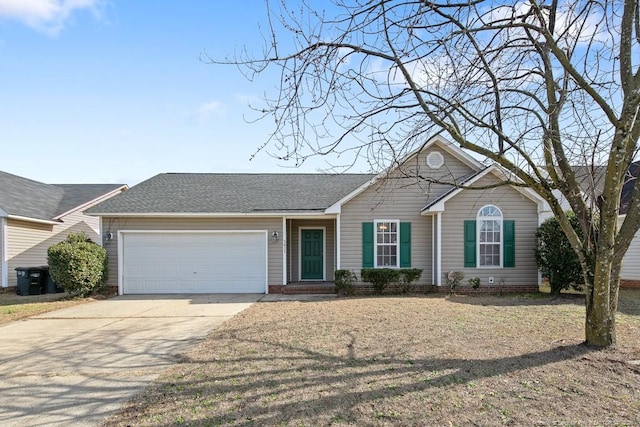 ranch-style home with a garage, concrete driveway, and roof with shingles