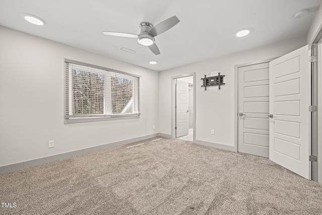 unfurnished bedroom with recessed lighting, a closet, a ceiling fan, carpet flooring, and baseboards