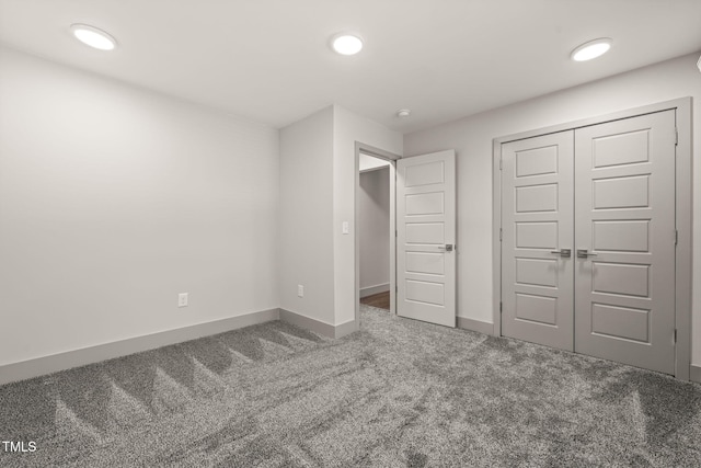 unfurnished bedroom with baseboards, carpet flooring, and recessed lighting