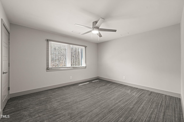 interior space featuring ceiling fan, carpet flooring, and baseboards