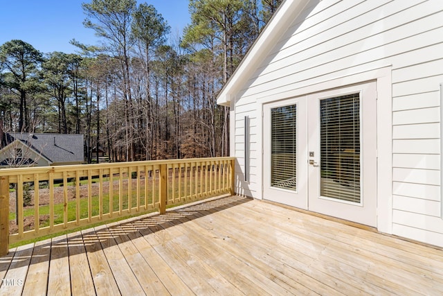 wooden terrace featuring french doors