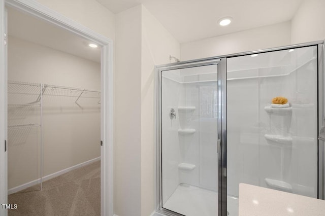 246 Holton St, Smithfield, NC 27577 - full bath featuring a spacious closet, a stall shower, and recessed lighting
