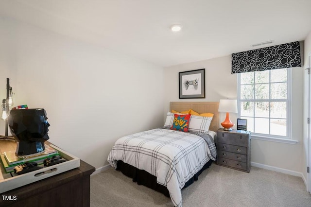 246 Holton St, Smithfield, NC 27577 - bedroom with baseboards and light colored carpet