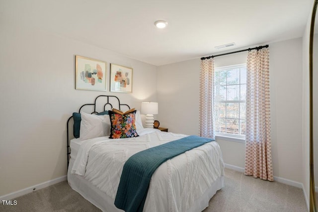 246 Holton St, Smithfield, NC 27577 - bedroom with light colored carpet, visible vents, and baseboards