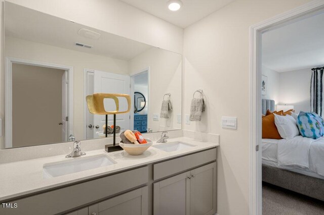 246 Holton St, Smithfield, NC 27577 - bathroom with ensuite bathroom, double vanity, a sink, and visible vents