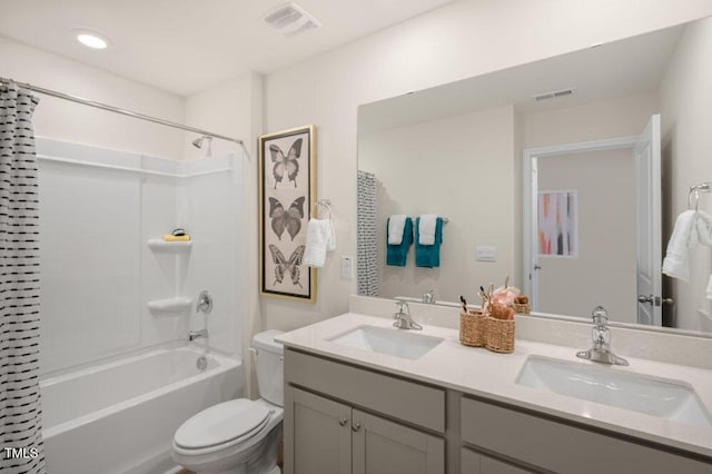 246 Holton St, Smithfield, NC 27577 - bathroom with shower / bath combo, visible vents, a sink, and double vanity