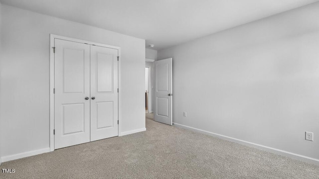 7521 Percussion Dr, Apex, NC 27539 - unfurnished bedroom with carpet flooring and a closet