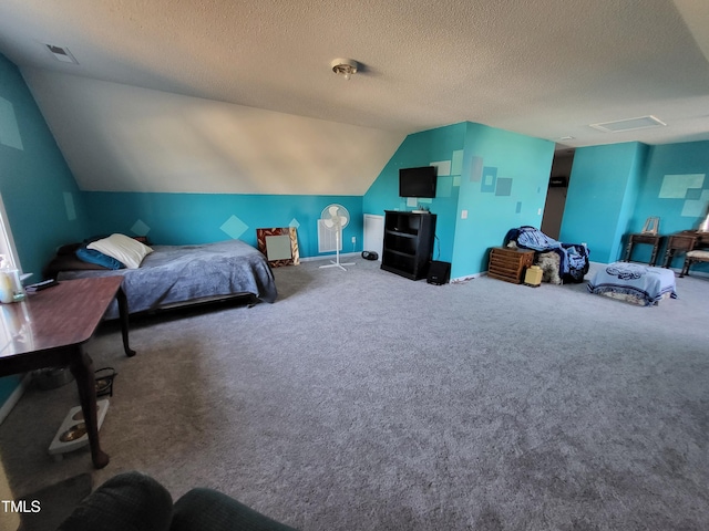 bedroom featuring lofted ceiling, a textured ceiling, visible vents, and carpet flooring