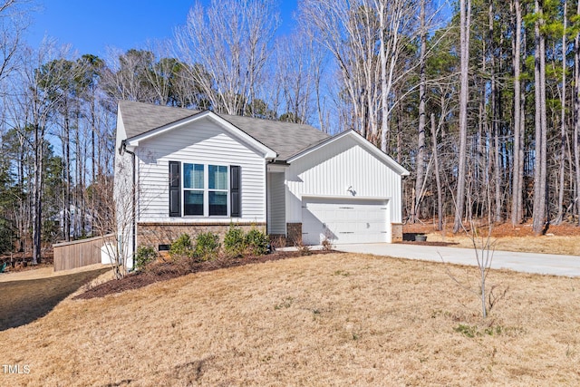 view of front of house featuring brick siding, concrete driveway, an attached garage, crawl space, and a front lawn