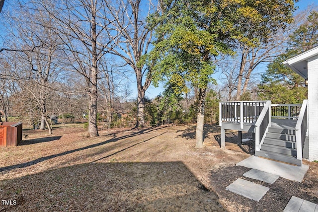 view of yard featuring a deck