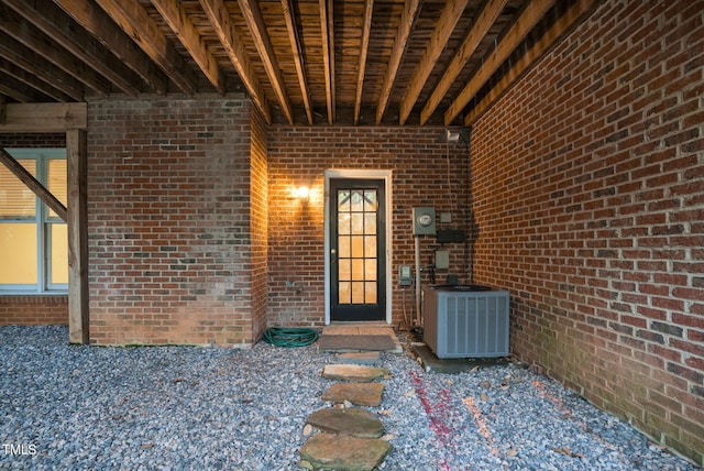 doorway to property with cooling unit