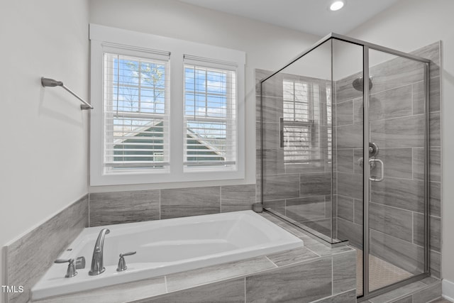 full bathroom with a stall shower, recessed lighting, and a bath