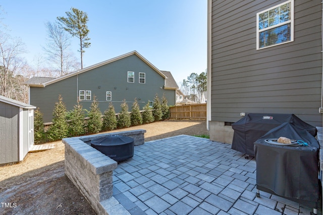 view of patio / terrace featuring area for grilling and fence