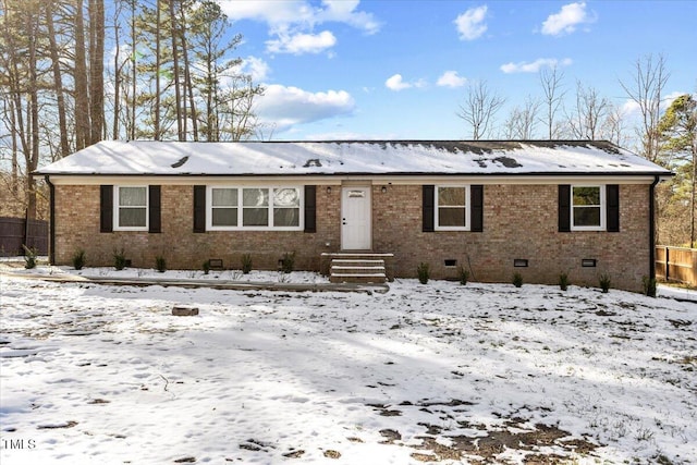 ranch-style house with brick siding and crawl space