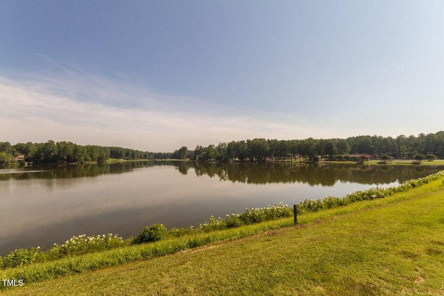 property view of water featuring a view of trees