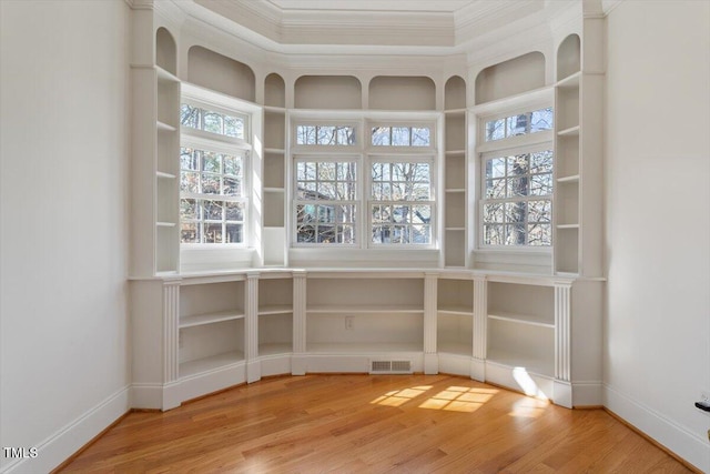 unfurnished sunroom with visible vents