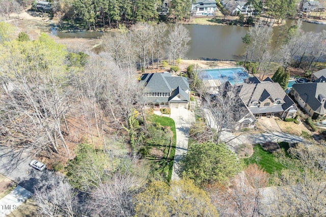 birds eye view of property featuring a water view