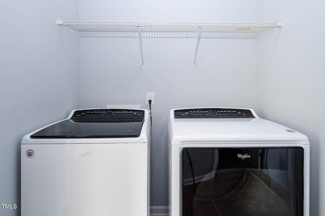 washroom with washer and clothes dryer