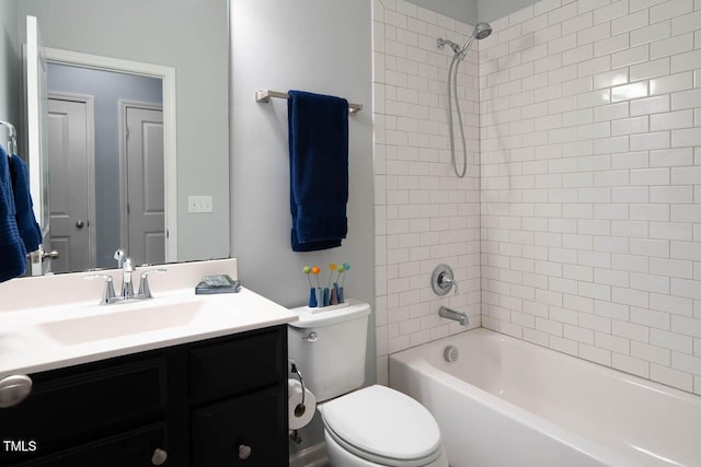 bathroom featuring vanity, toilet, and bathing tub / shower combination