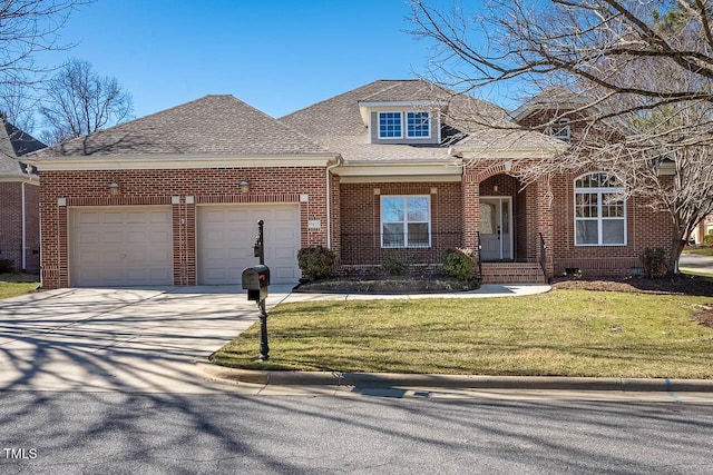 view of front of property featuring roof with shingles, a front lawn, concrete driveway, a garage, and brick siding