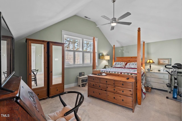 bedroom featuring visible vents, baseboards, vaulted ceiling, carpet flooring, and a ceiling fan