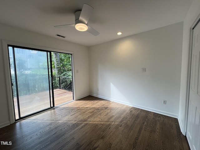 unfurnished room with baseboards, visible vents, dark wood-style floors, ceiling fan, and recessed lighting