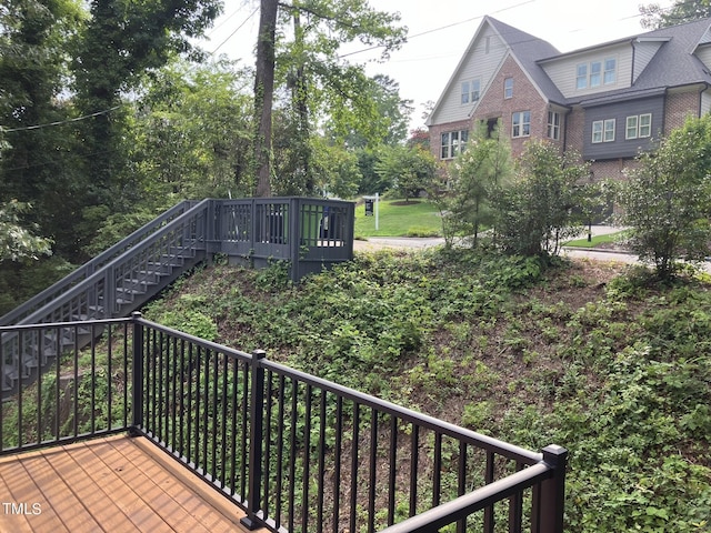 exterior space with stairs and a wooden deck