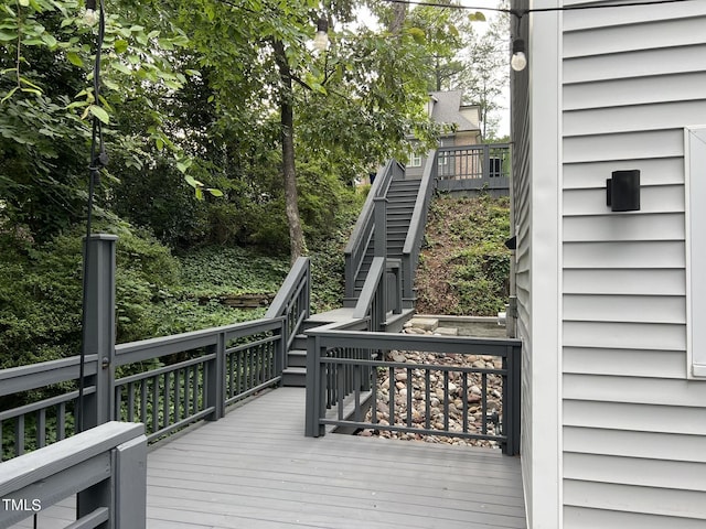 deck featuring stairs