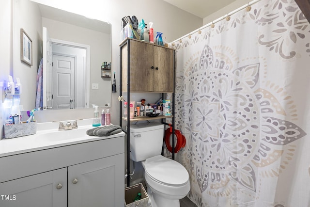 full bathroom featuring toilet and vanity