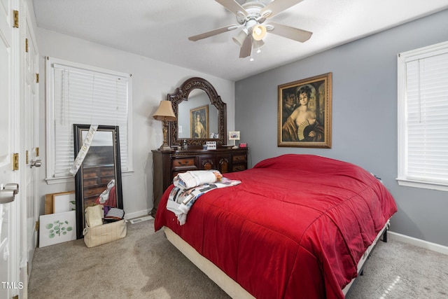 bedroom featuring ceiling fan, baseboards, and carpet flooring