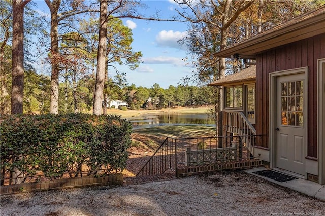 view of yard featuring a water view