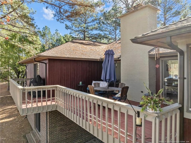 deck with outdoor dining space