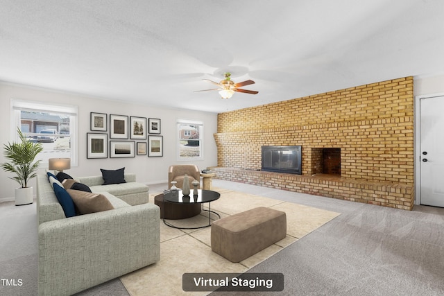 carpeted living area featuring a brick fireplace, ceiling fan, and a textured ceiling