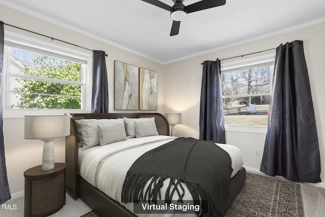 bedroom featuring baseboards, multiple windows, a ceiling fan, and crown molding