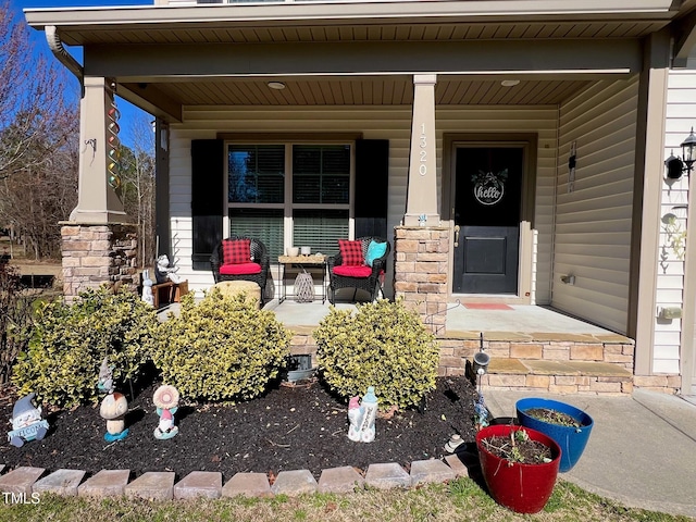 entrance to property with covered porch